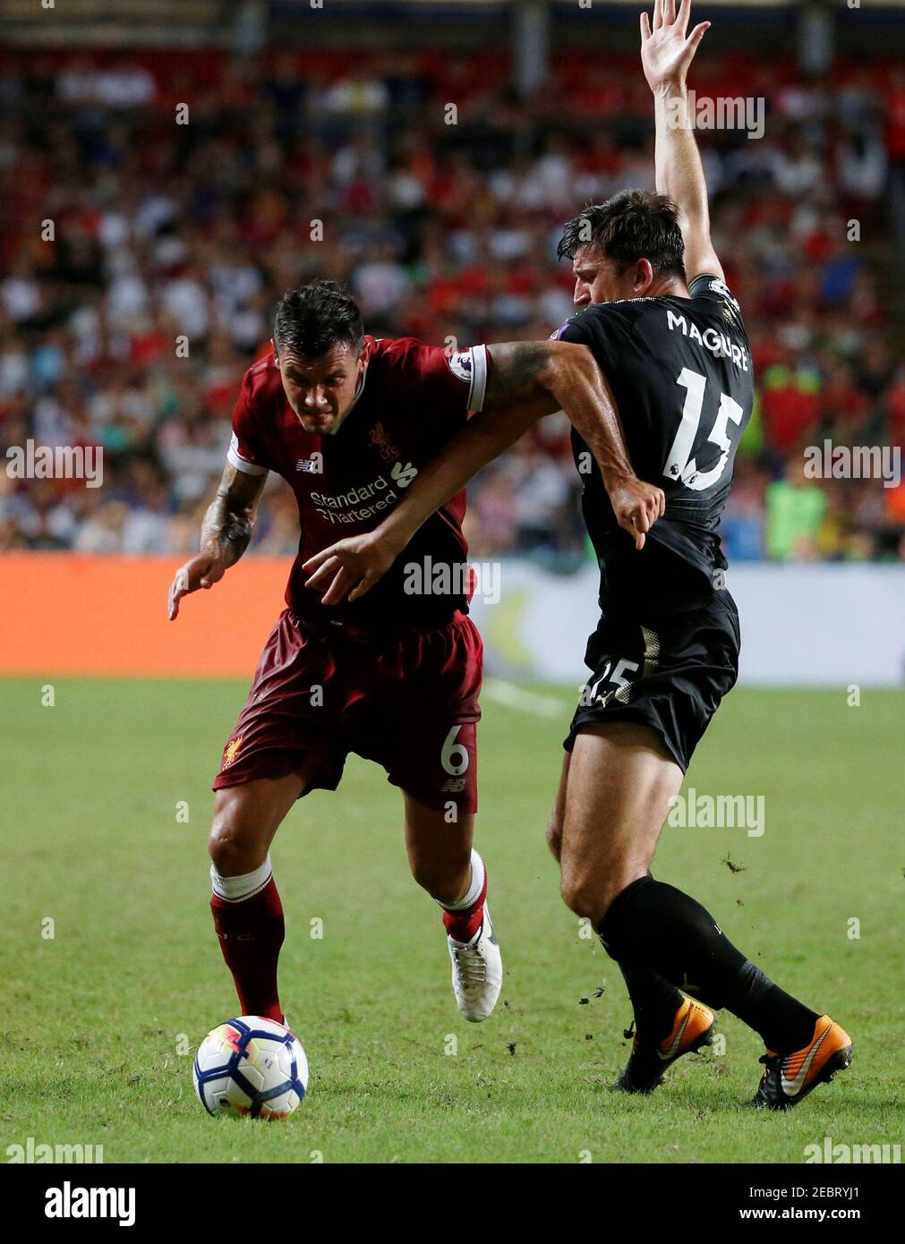 Soccer Football - Leicester City v Liverpool - Pre Season Friendly - The Premier League Asia Trophy - Final - June 22, 2017   Liverpool's Dejan Lovren in action with Leicester City's Harry Maguire   REUTERS/BOBBY YIP Stock Photo