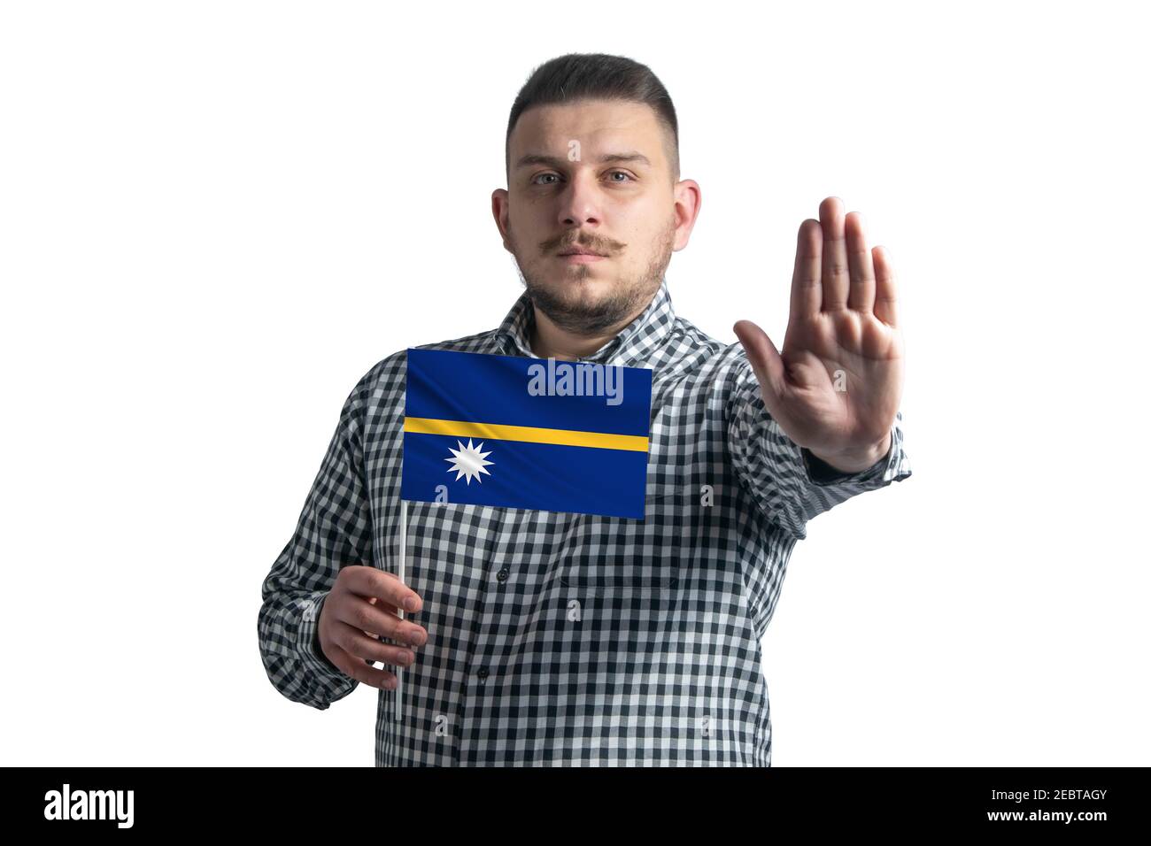 White guy holding a flag of Nauru and with a serious face shows a hand