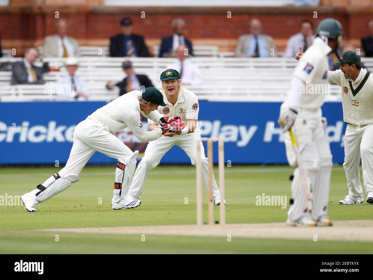 Cricket - Pakistan v Australia First Test - 2nd Day - Lord's - 14/7/10  Imran Farhat of Pakistan is caught out by Tim Paine of Australia (L) as  Shane Watson (C) and