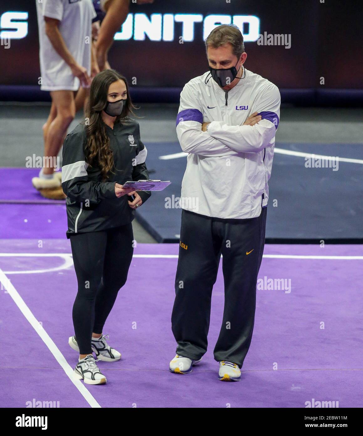 Baton Rouge, LA, USA. 22nd Jan, 2021. LSU Head Coach Jay Clark and  Assistant Coach Ashleigh Gnat have a discussion during warmups before NCAA  Gymnastics action between the #1 ranked Florida Gators