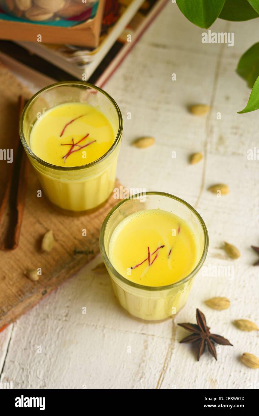 Turmeric milk Indian Ayurveda drink. Anti viral healthy Ayurvedic drink
