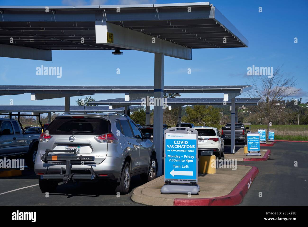 Covid vaccination signs at parking lot of Kaiser Permanente in Santa