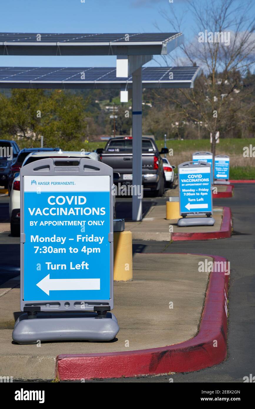 Covid vaccination signs at parking lot of Kaiser Permanente in Santa Rosa, California Stock Photo