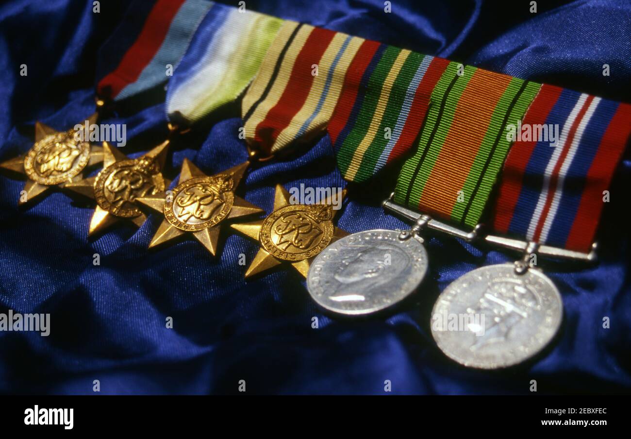 WAR MEDALS AND RIBBONS INCLUDING THE AFRICA STAR AND THE PACIFIC STAR MEDALS. Stock Photo