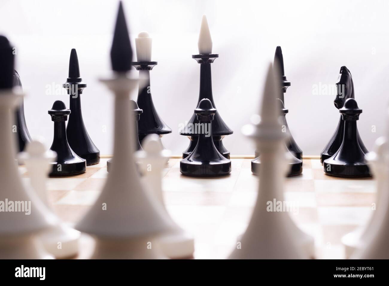Board game chess with chess pieces in front of white background Stock ...