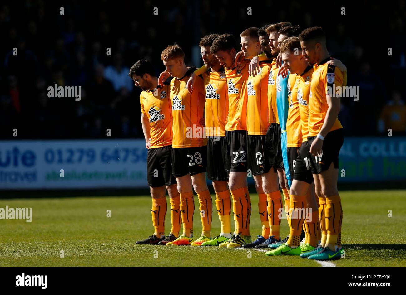 Britain Football Soccer - Cambridge United v Stevenage - Sky Bet League Two  - Cambs Glass Stadium - 25/3/17 Cambridge players observe a minutes silence  in respect for the victims of the