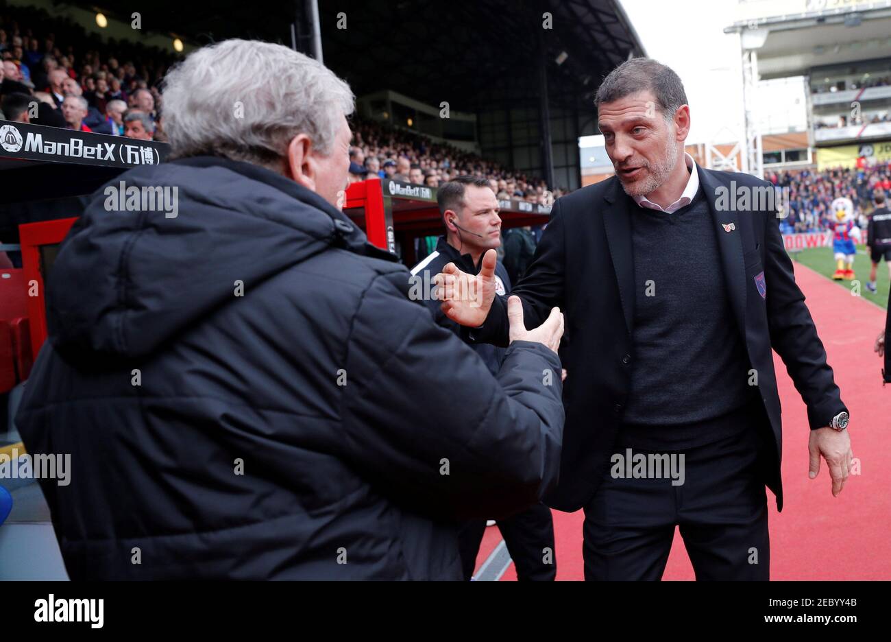 Soccer Football - Premier League - Crystal Palace vs West Ham United - Selhurst Park, London, Britain - October 28, 2017   Crystal Palace manager Roy Hodgson and West Ham United manager Slaven Bilic shake hands   REUTERS/Eddie Keogh    EDITORIAL USE ONLY. No use with unauthorized audio, video, data, fixture lists, club/league logos or 'live' services. Online in-match use limited to 75 images, no video emulation. No use in betting, games or single club/league/player publications. Please contact your account representative for further details.? Stock Photo