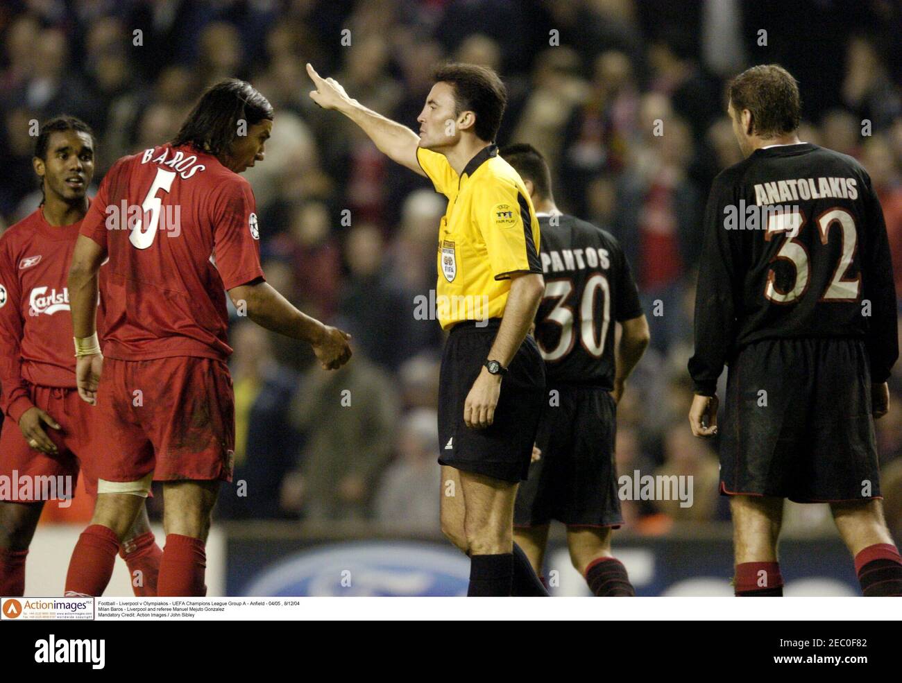 Football - Liverpool v Olympiakos - UEFA Champions League Group A - Anfield  - 04/05 , 8/12/04 Milan Baros - Liverpool and referee Manuel Mejuto  Gonzalez Mandatory Credit: Action Images / John Sibley Stock Photo - Alamy