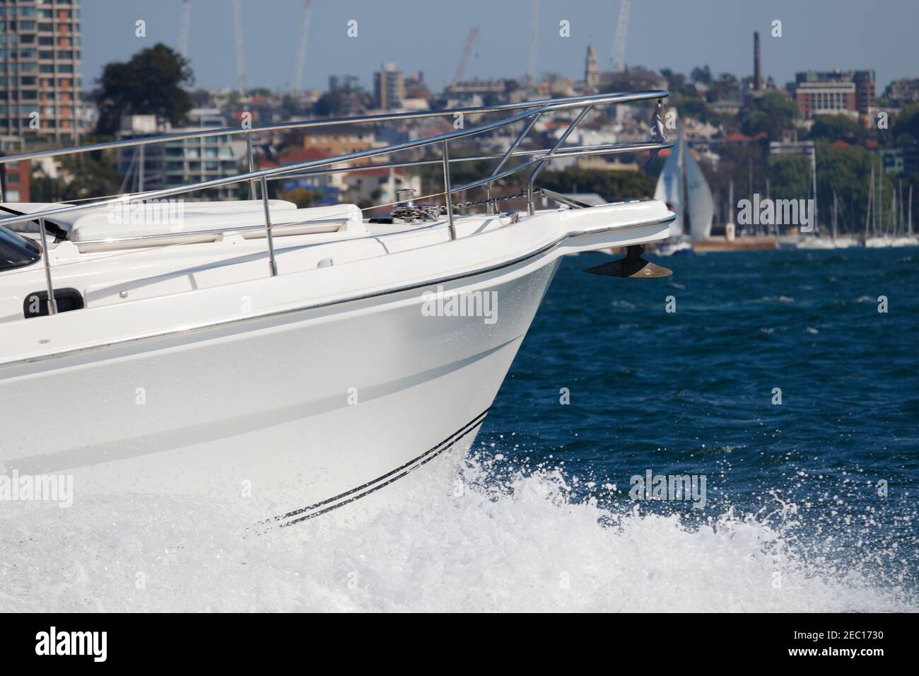 A motorboat passes by. Waves splashing. Partial view of the bow of the boat Stock Photo