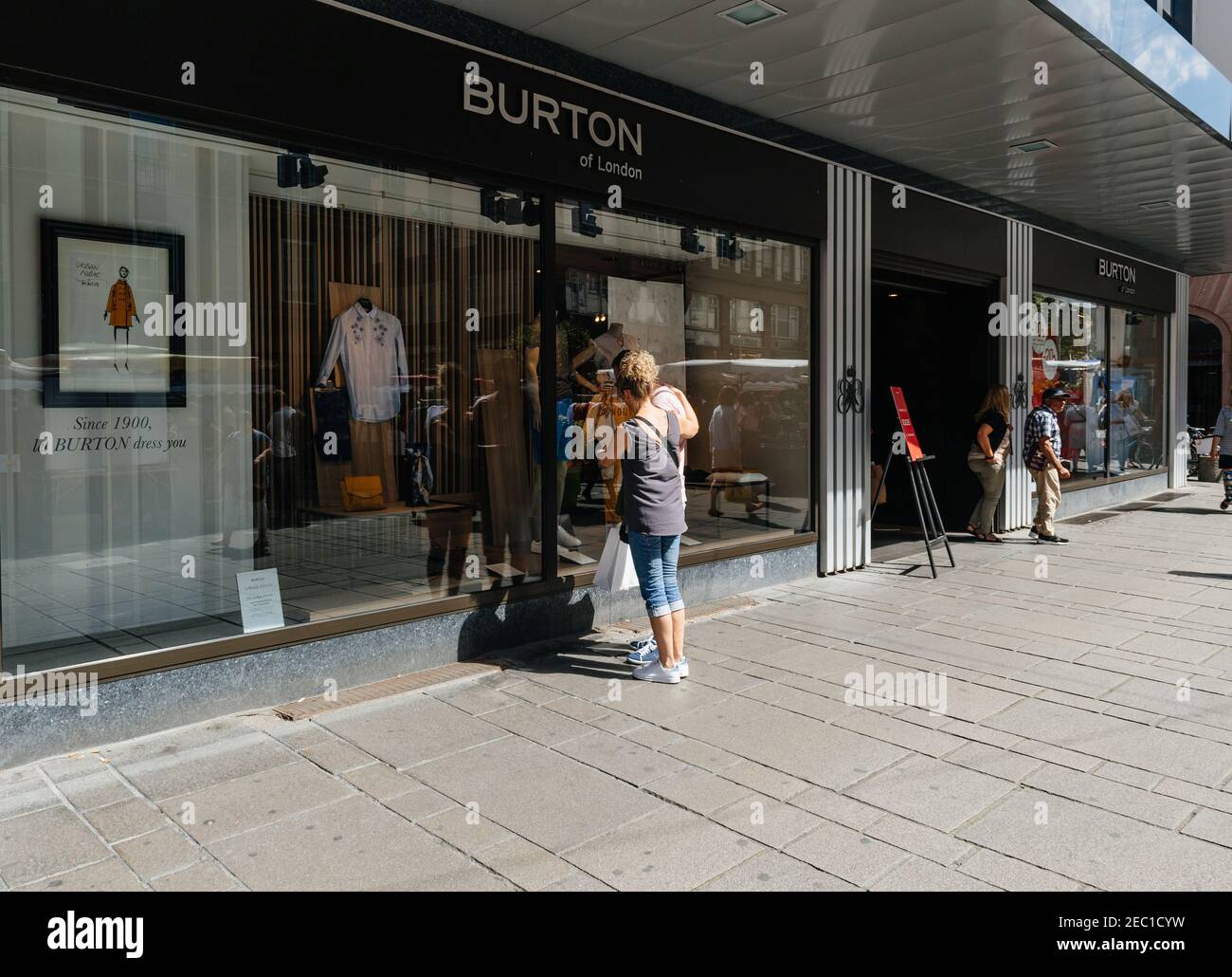 Strasbourg, France - July 29, 2017: Female customer in front of the  showcase of Burton of London male and female clothes store in central  Strasbourg Stock Photo - Alamy