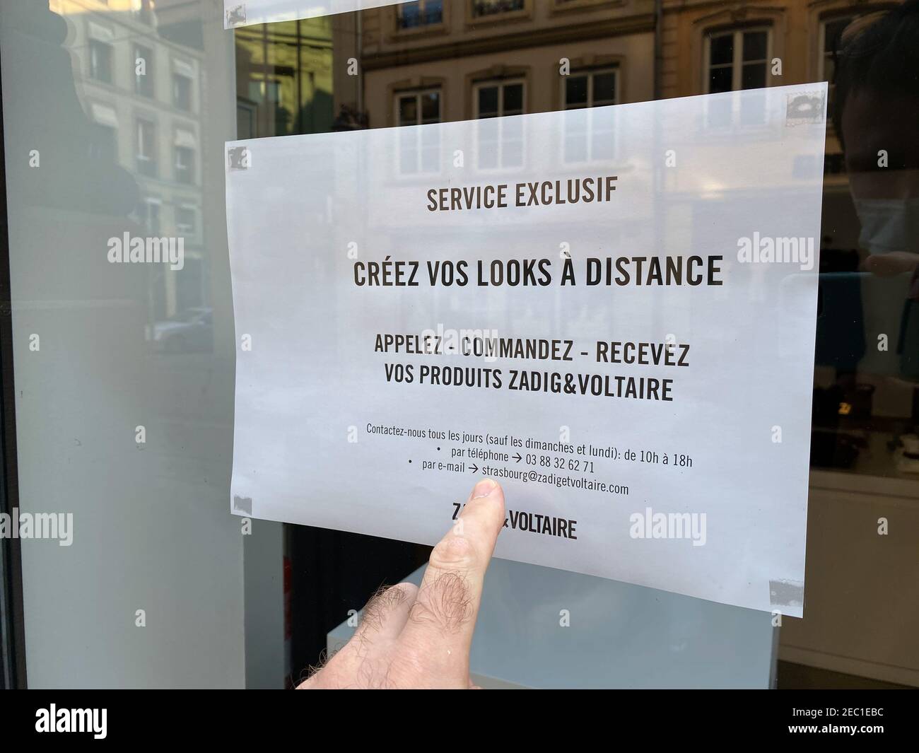 Strasbourg, France - Oct 31, 2020: Advertising of Zadig and Voltaire  closure due to COVID-19 lockdown pandemic offering Click and Collect  services order online and delivery of merchandise Stock Photo - Alamy