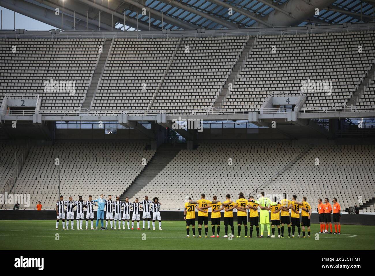 Soccer Football - Greek Cup Final - PAOK Salonika v AEK Athens - OAKA  Spiros Louis, Athens, Greece - May 11, 2019 The teams line up during a  minutes silence in an