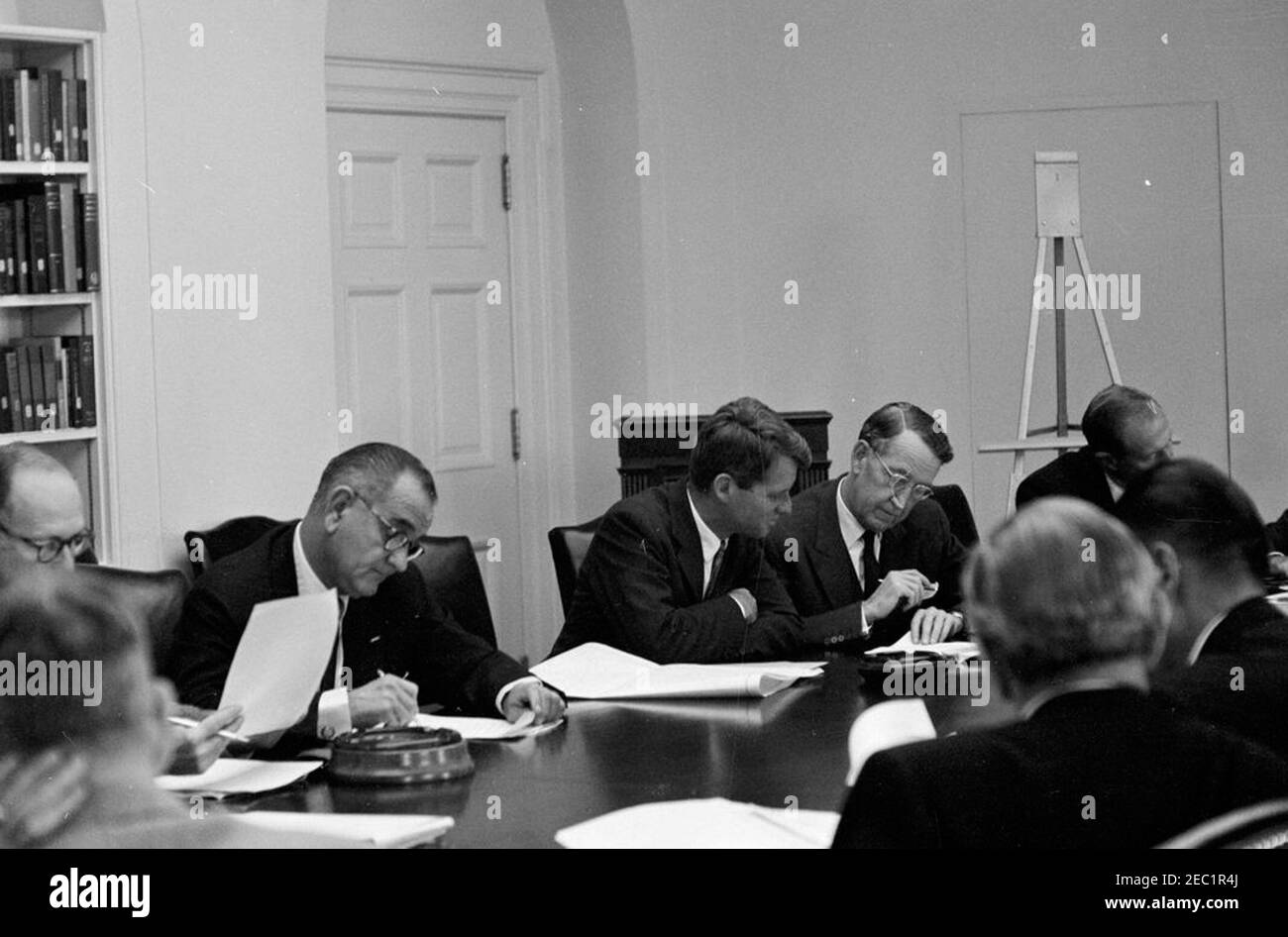 National Security Council Executive Committee (EXCOMM) Meeting, 10:10AM. Meeting of the Executive Committee of the National Security Council (EXCOMM). Seated at table (clockwise from bottom left): Chairman of the Joint Chiefs of Staff General Maxwell D. Taylor, Secretary of the Treasury C. Douglas Dillon, Vice President Lyndon B. Johnson, Attorney General Robert F. Kennedy, former U.S. Ambassador to the Soviet Union Llewellyn Thompson, Director of the Arms Control and Disarmament Agency (ACDA) William C. Foster, Secretary of Defense Robert S. McNamara, and Deputy Secretary of Defense Roswell G Stock Photo