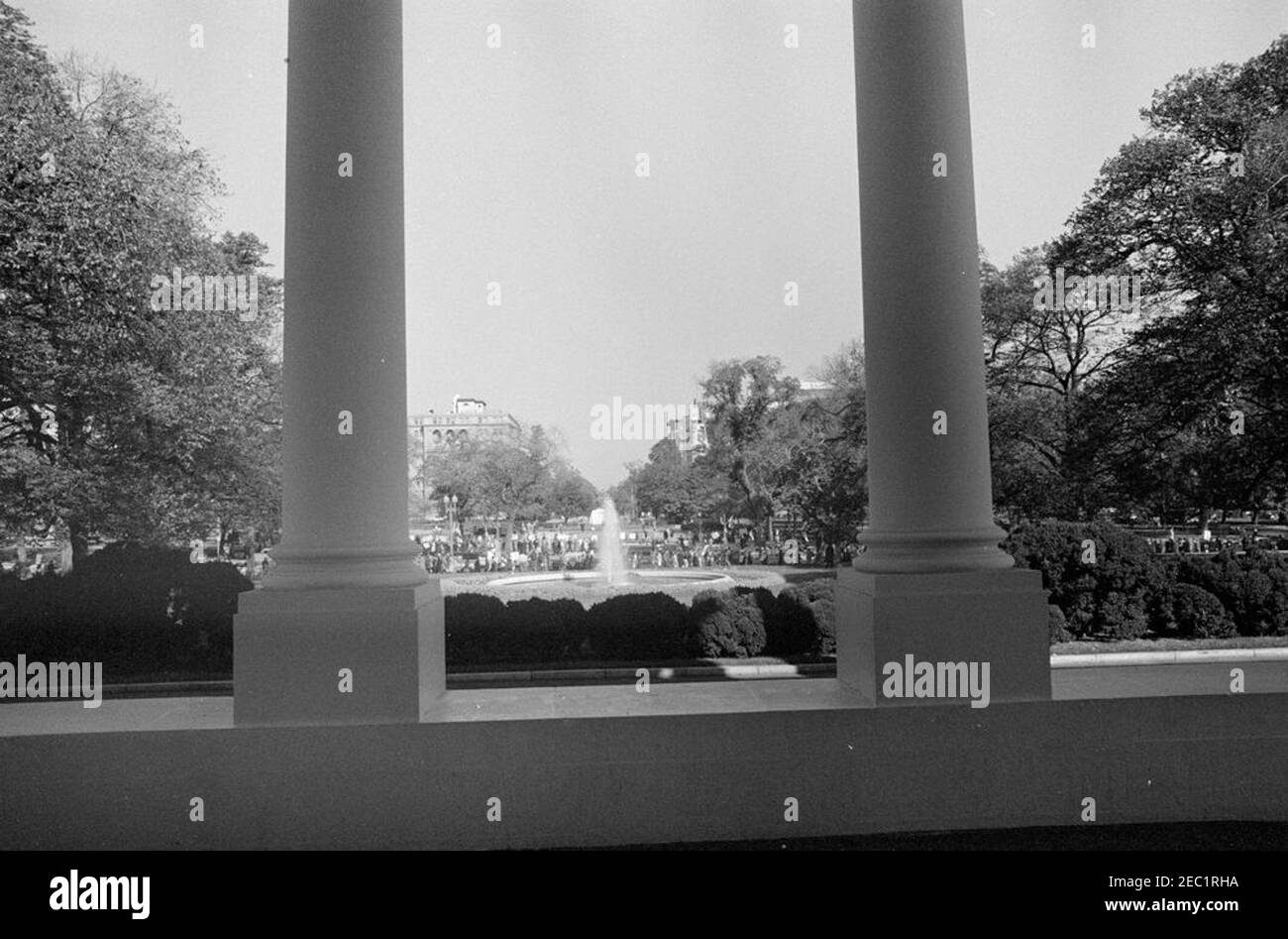 Demonstrators at the White House. View from the North Portico of the White House, as demonstrators picket along Pennsylvania Avenue in response to the crisis in Cuba. Washington, D.C. Stock Photo
