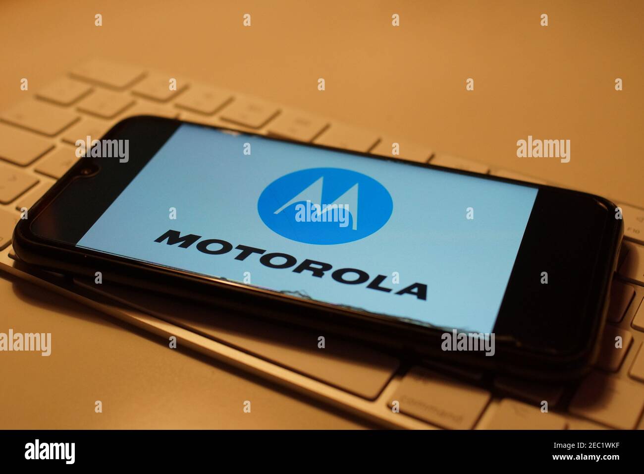 Smartphone with Motorola logo on computer keyboard Stock Photo