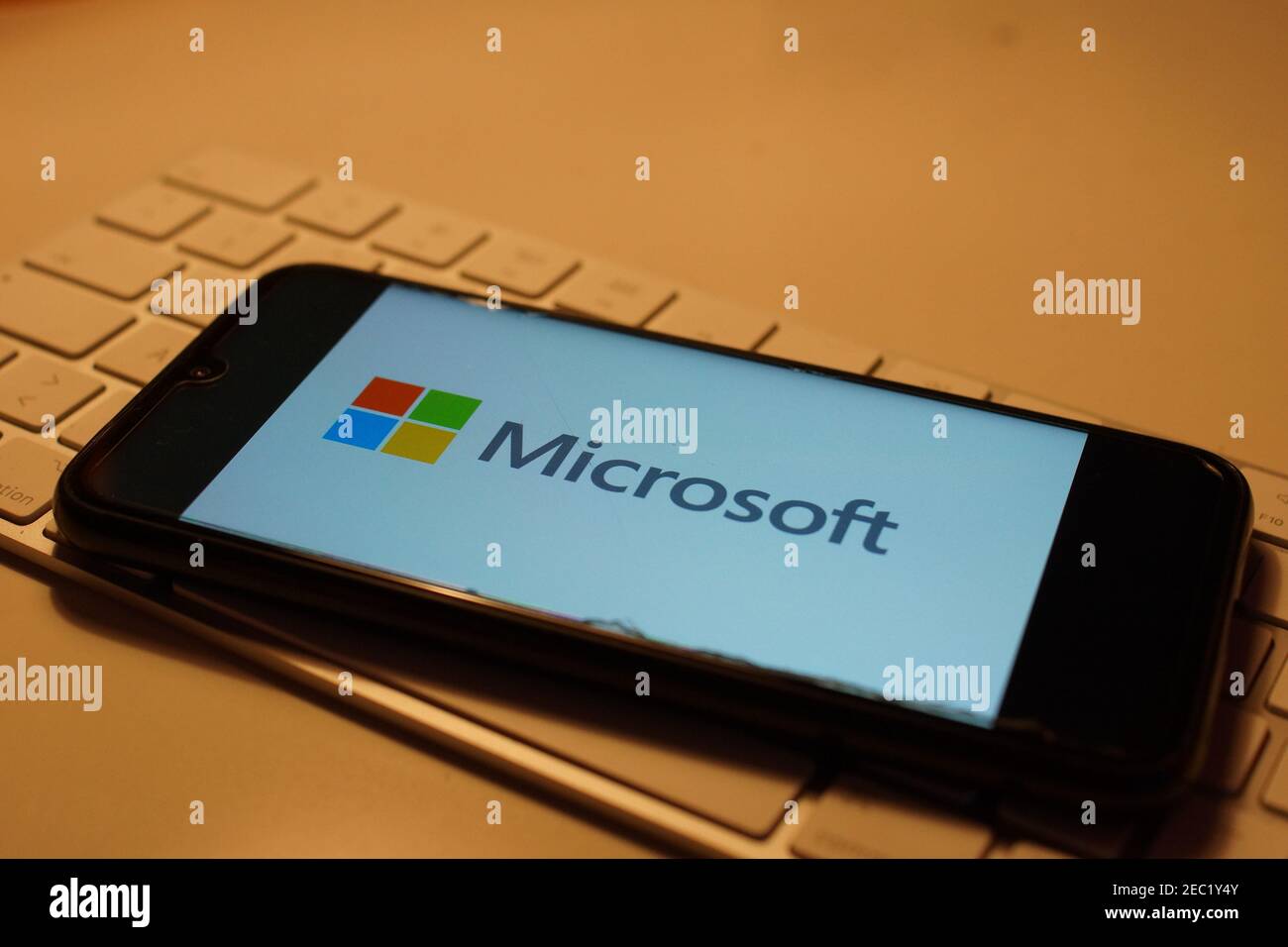 Smartphone with Microsoft logo on computer keyboard Stock Photo