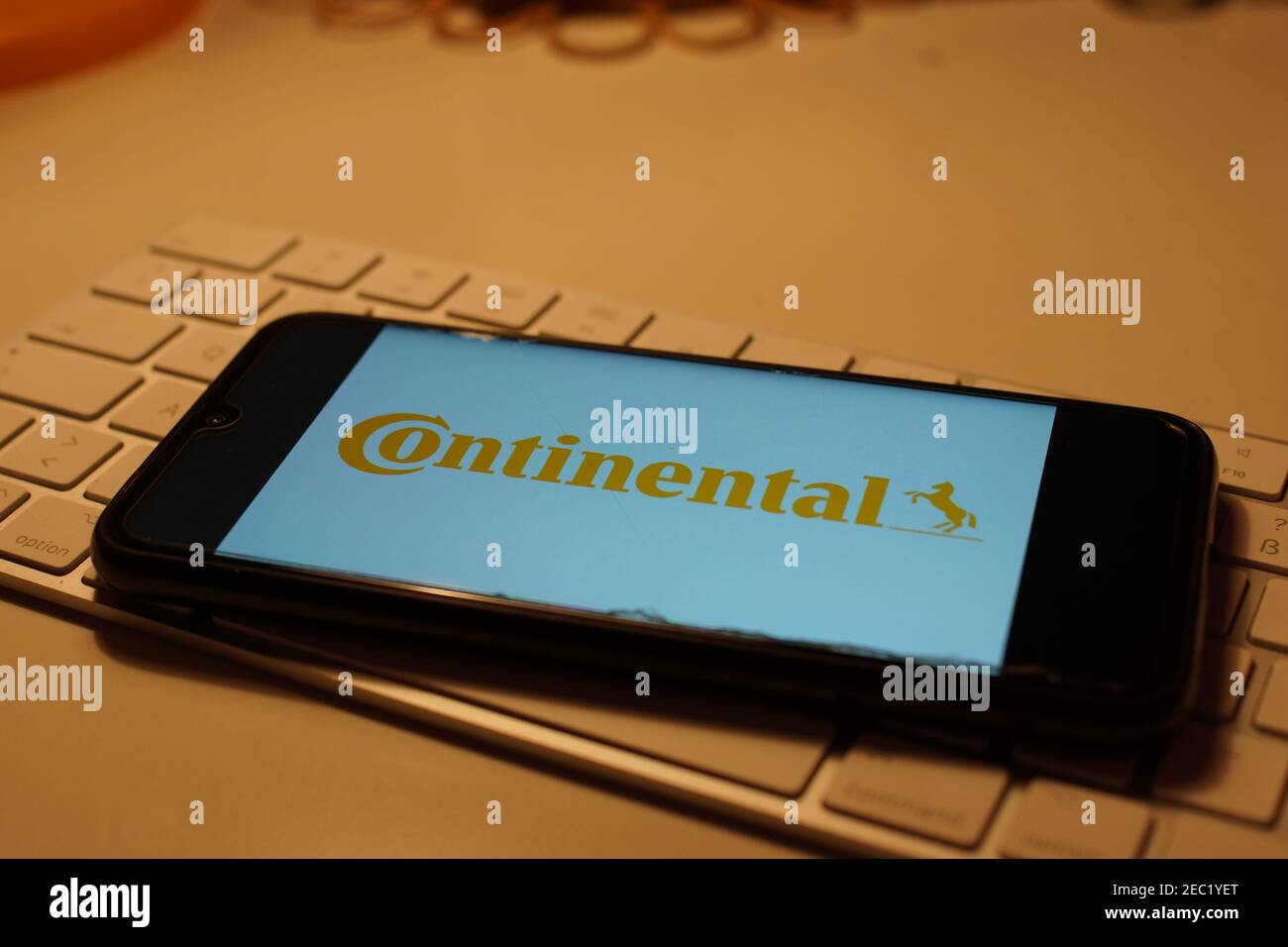 Smartphone with Continental logo on computer keyboard Stock Photo