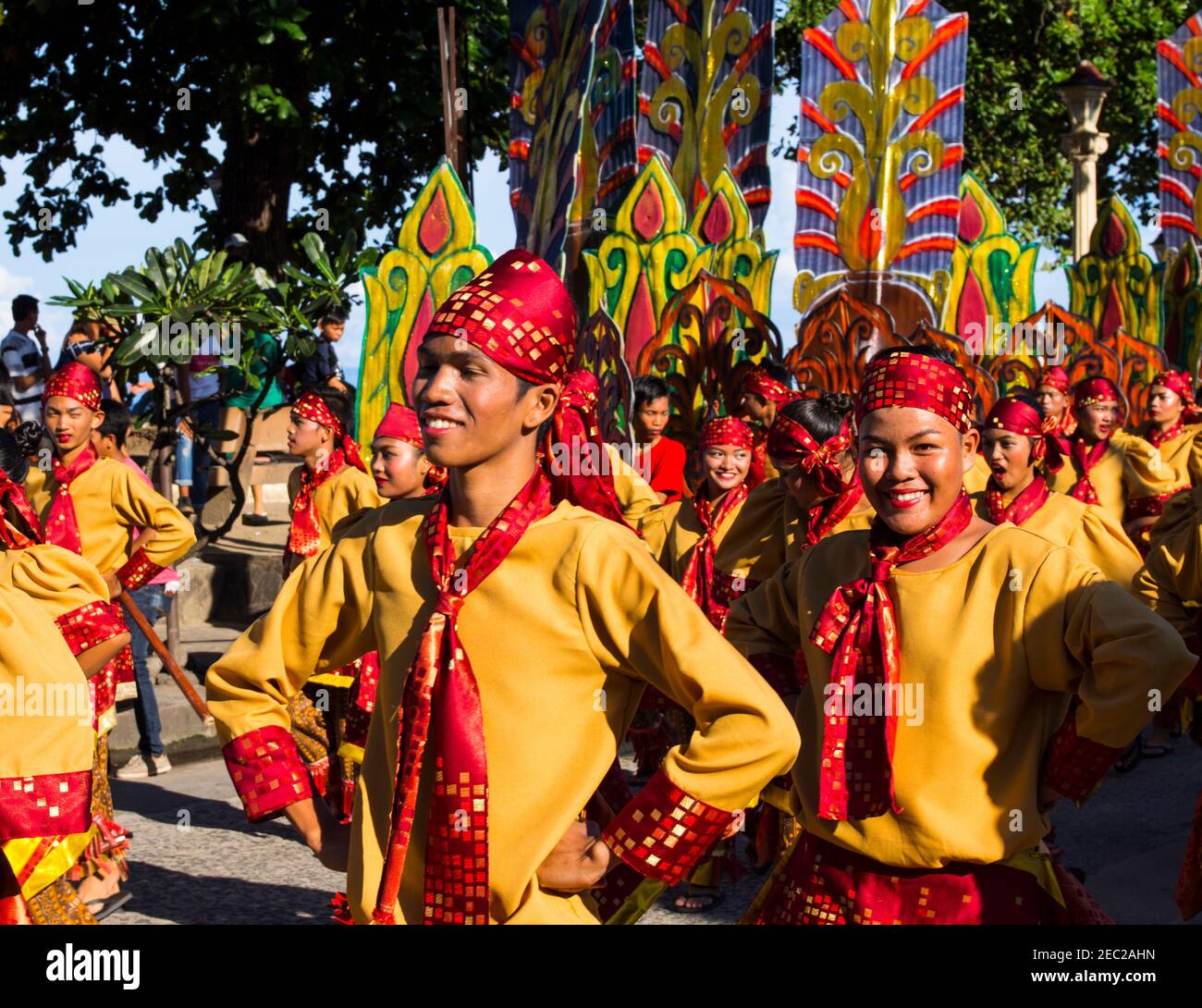 16 Sep 2017, Dumaguete, Philippines - smiling children participating in street  costume parade. Sandurot festival street dance. Boy in national costume  Stock Photo - Alamy
