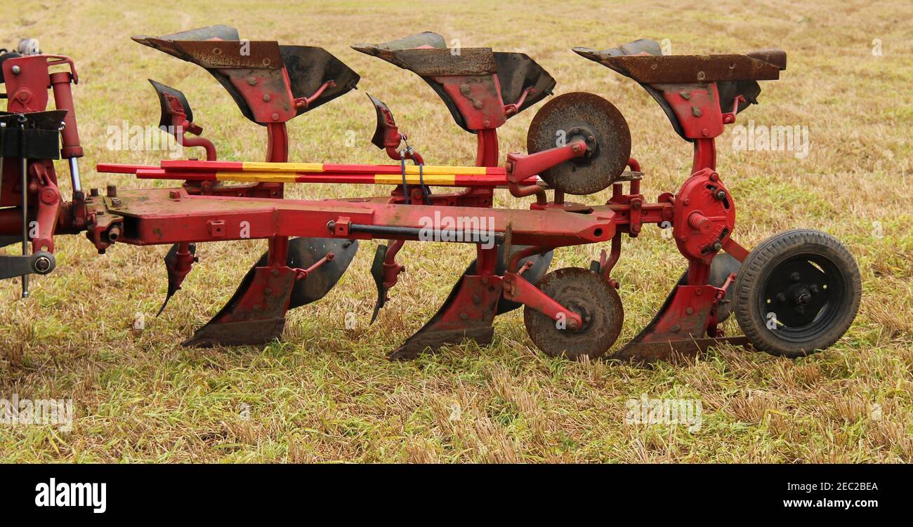 A Vintage Tractor Pulled Agricultural Farming Plough Stock Photo - Alamy