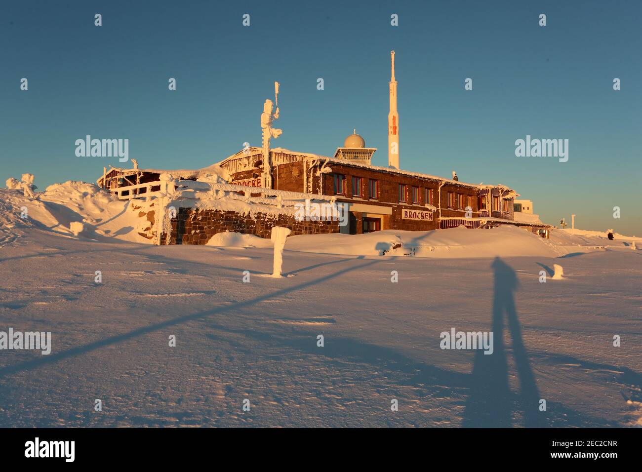 Schierke, Germany. 13th Feb, 2021. The tracks of the Harzer Schmalspurbahn HSB are snowed in. Icy cold wind blows today on the Brocken. Temperatures of minus 20 degrees were measured on the highest Harz peak. Only a few hikers ventured to the Brocken at the icy temperatures for sunrise. Credit: Matthias Bein/dpa-Zentralbild/dpa/Alamy Live News Stock Photo