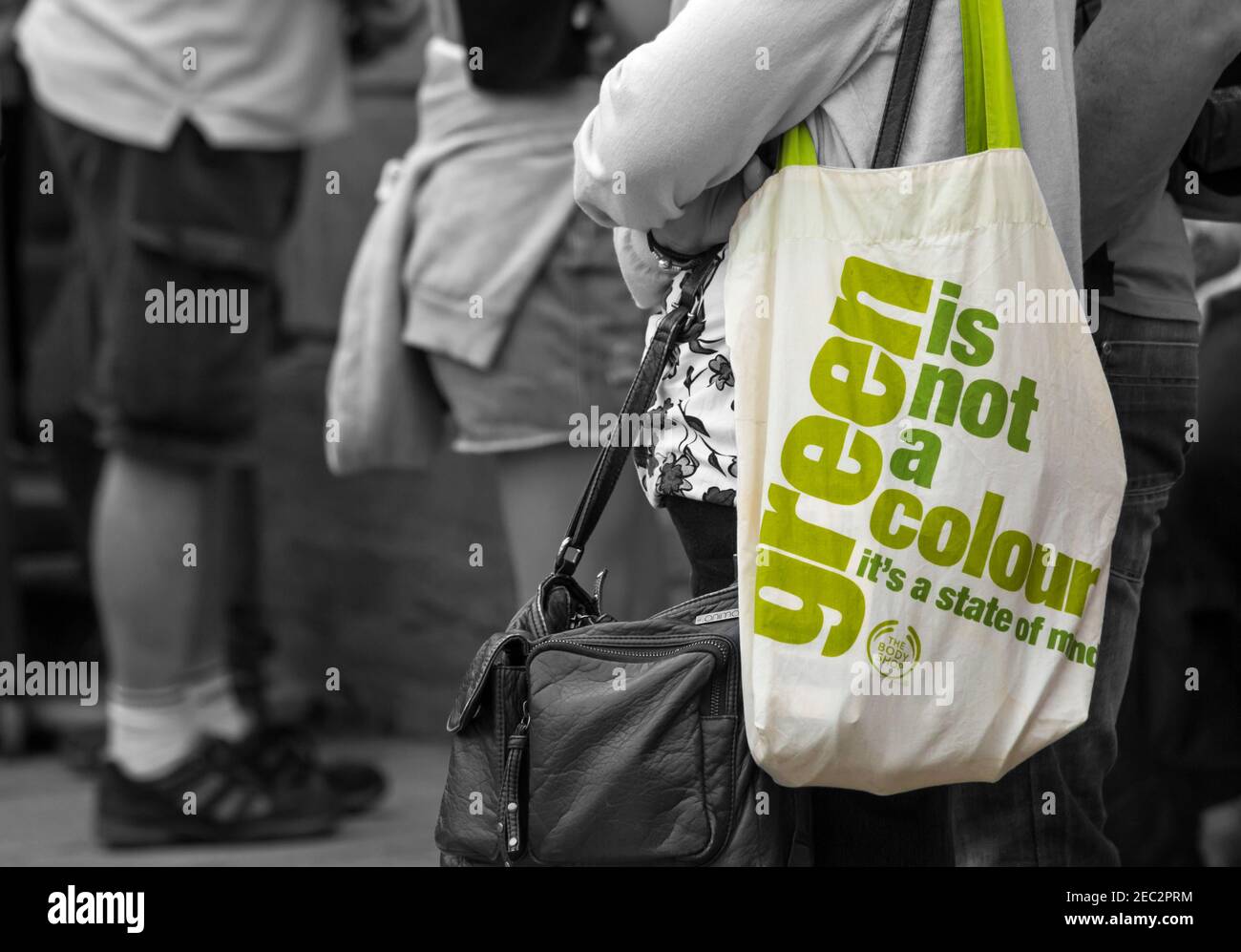 Green is not a colour it's a state of mind organic cotton reusable tote bag from the Body Shop at Wimborne Folk Festival, Dorset, UK in June Stock Photo