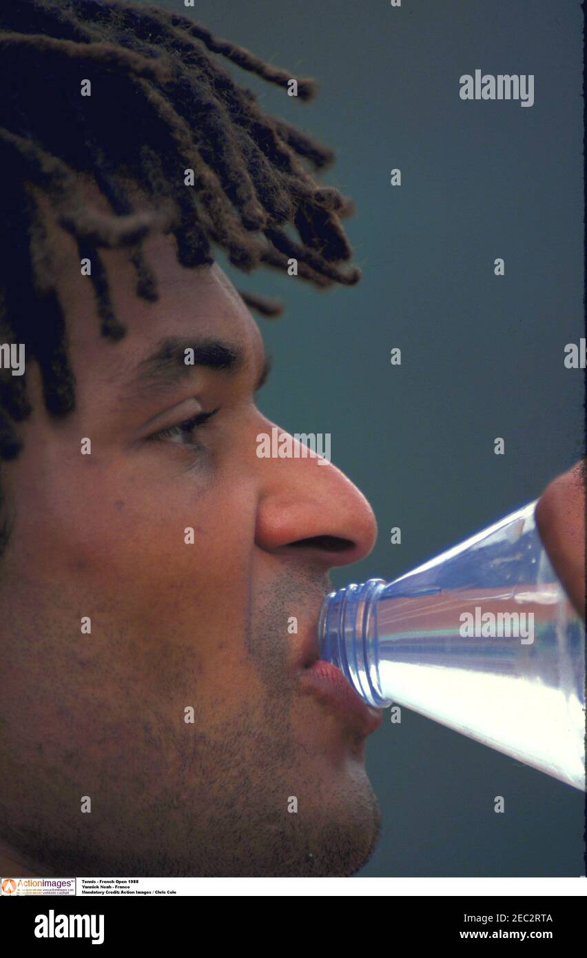 Download Yannick Noah in action during a National Tennis League match. Wallpaper
