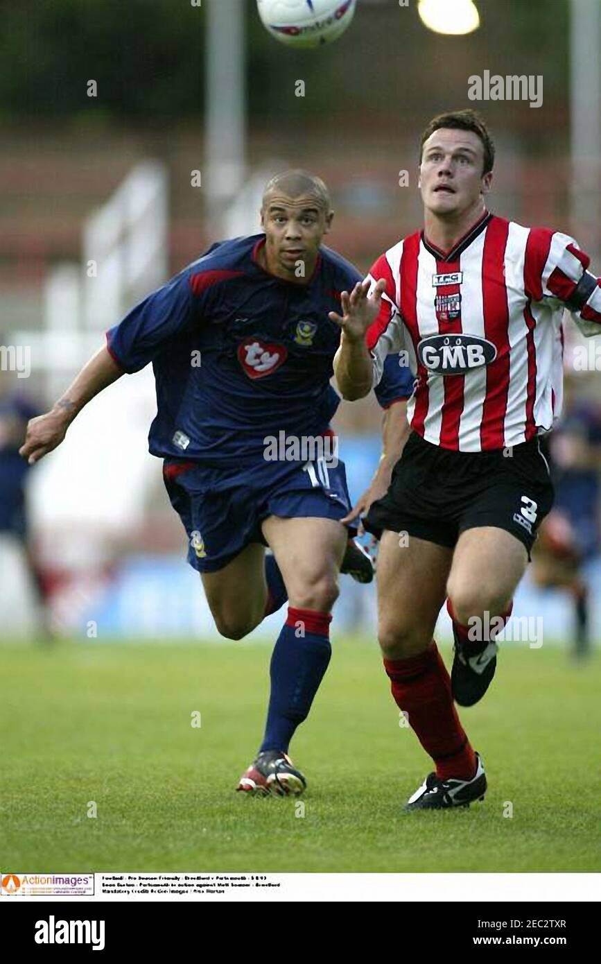 Football - Pre-Season Friendly - Brentford v Portsmouth - 5/8/03 Deon Burton  - Portsmouth in action against Matt Somner - Brentford Mandatory Credit:  Action Images / Alex Morton Stock Photo - Alamy