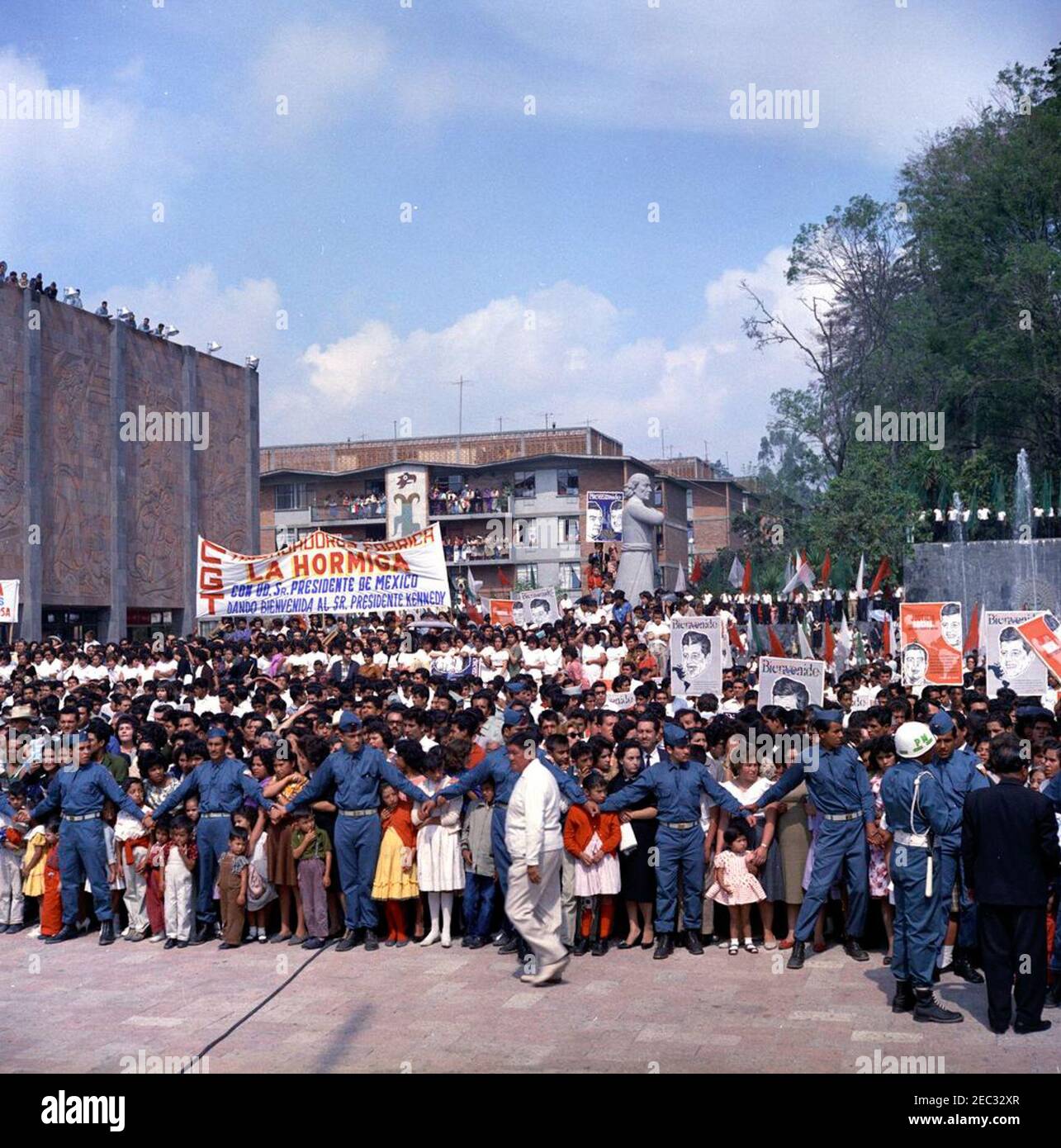 Trip to Mexico: Tour and address at the Independencia Housing Project, 9:35AM. Spectators gather to see President John F. Kennedy during his visit to the Unidad Independencia (Independencia Housing Project) in Mexico City, Mexico. Stock Photo