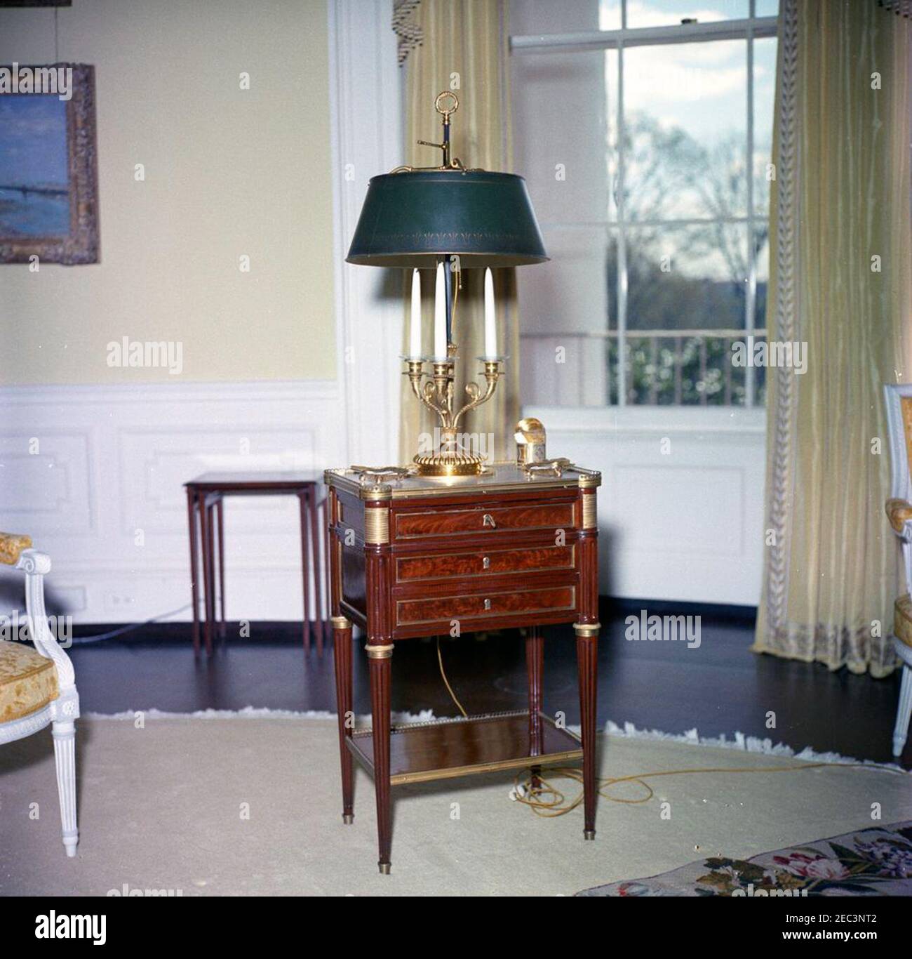 White House furniture. Small table with candelabra lamp in the