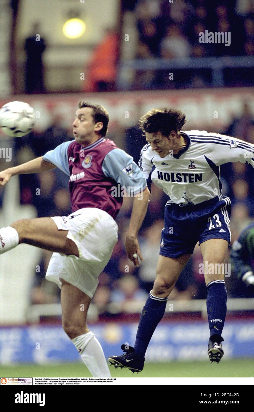 Football - F.A Barclaycard Premiership , West Ham United v Tottenham  Hotspur , 24/11/01 Simon Davies - Tottenham Hotspur in action against Don  Hutchison - West Ham United Mandatory Credit:Action Images / Brandon Malone  Stock Photo - Alamy