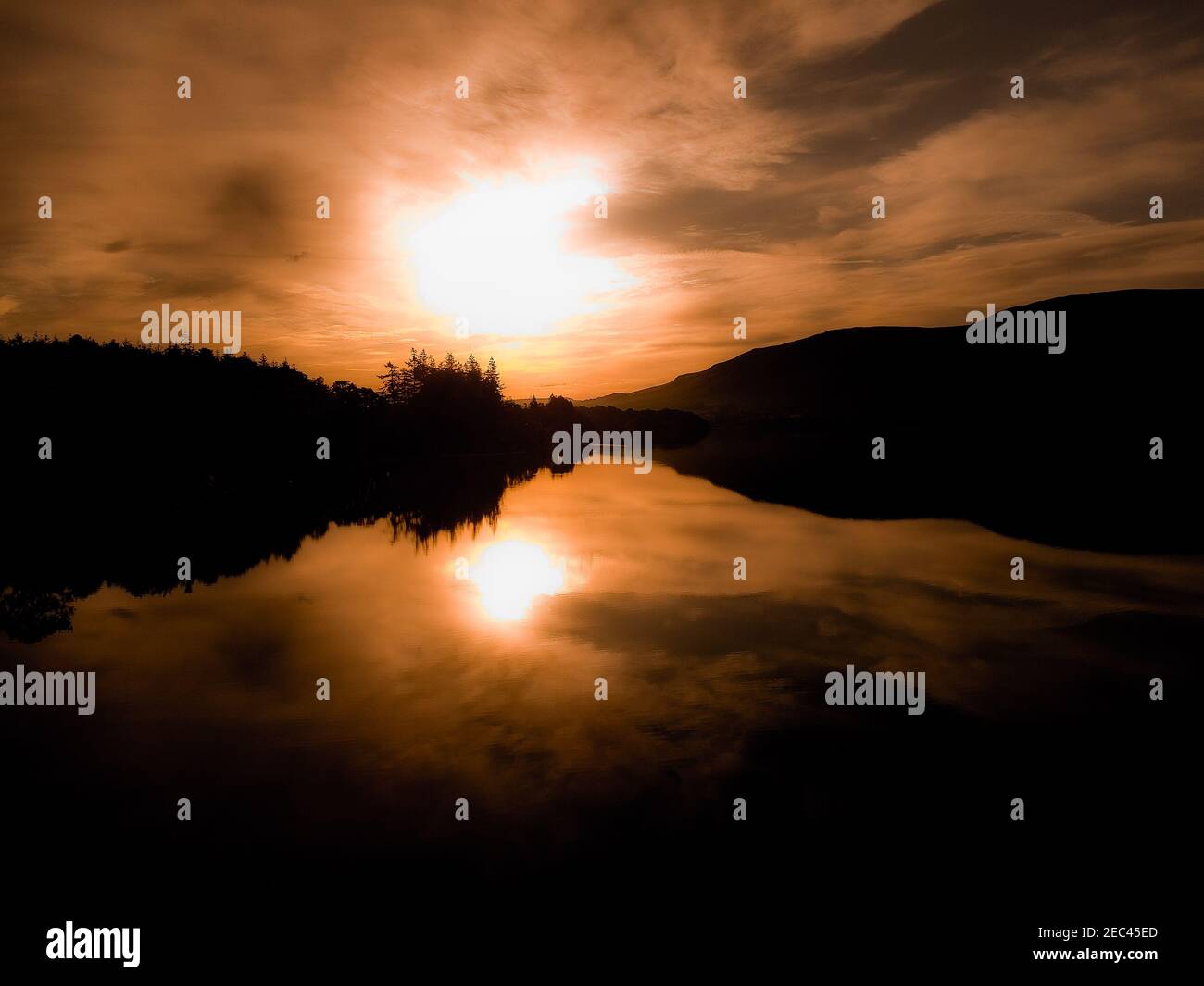 Dramatic sunrise over lake Ullswater Stock Photo