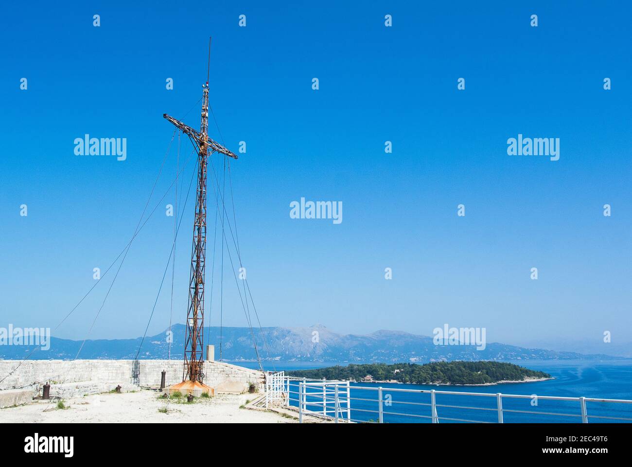 Metal Cross at the top of Venetian Fortress, Corfu Town, Corfu, Greece Stock Photo