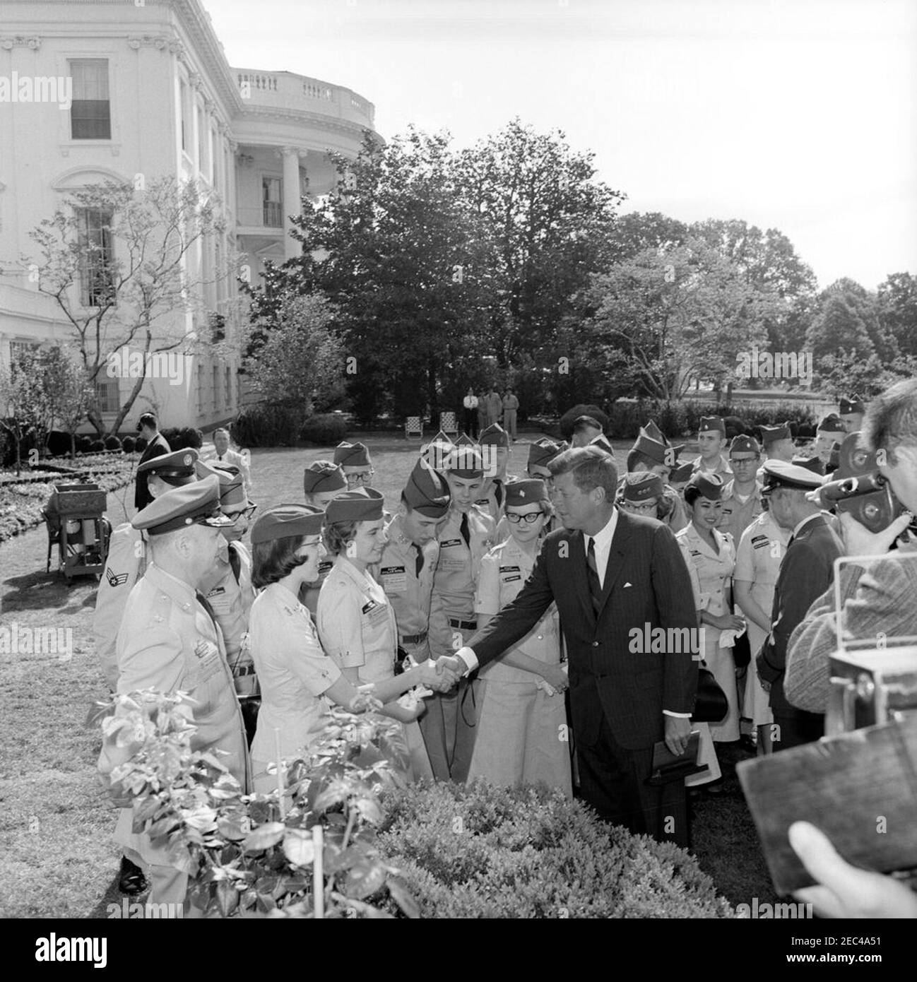 Visit of Civil Air Patrol cadets 9 50AM. President John F. Kennedy visits with a group of Civil Air Patrol cadets in the Rose Garden of the White House Washington D.C. Left to