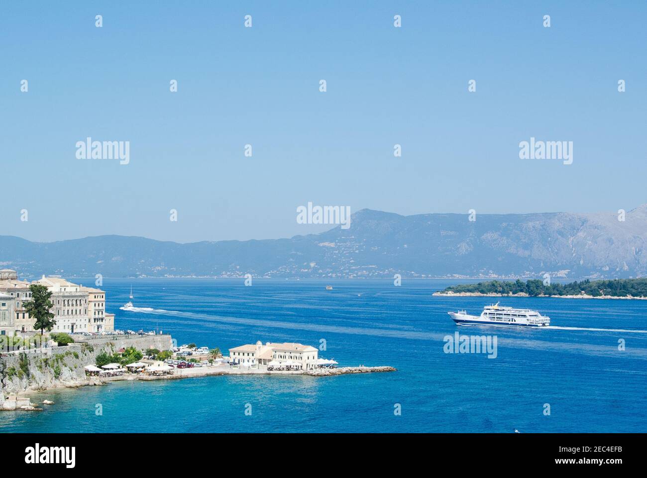 View across Faliraki towards Mount Pantokrator, Corfu, Greece Stock Photo