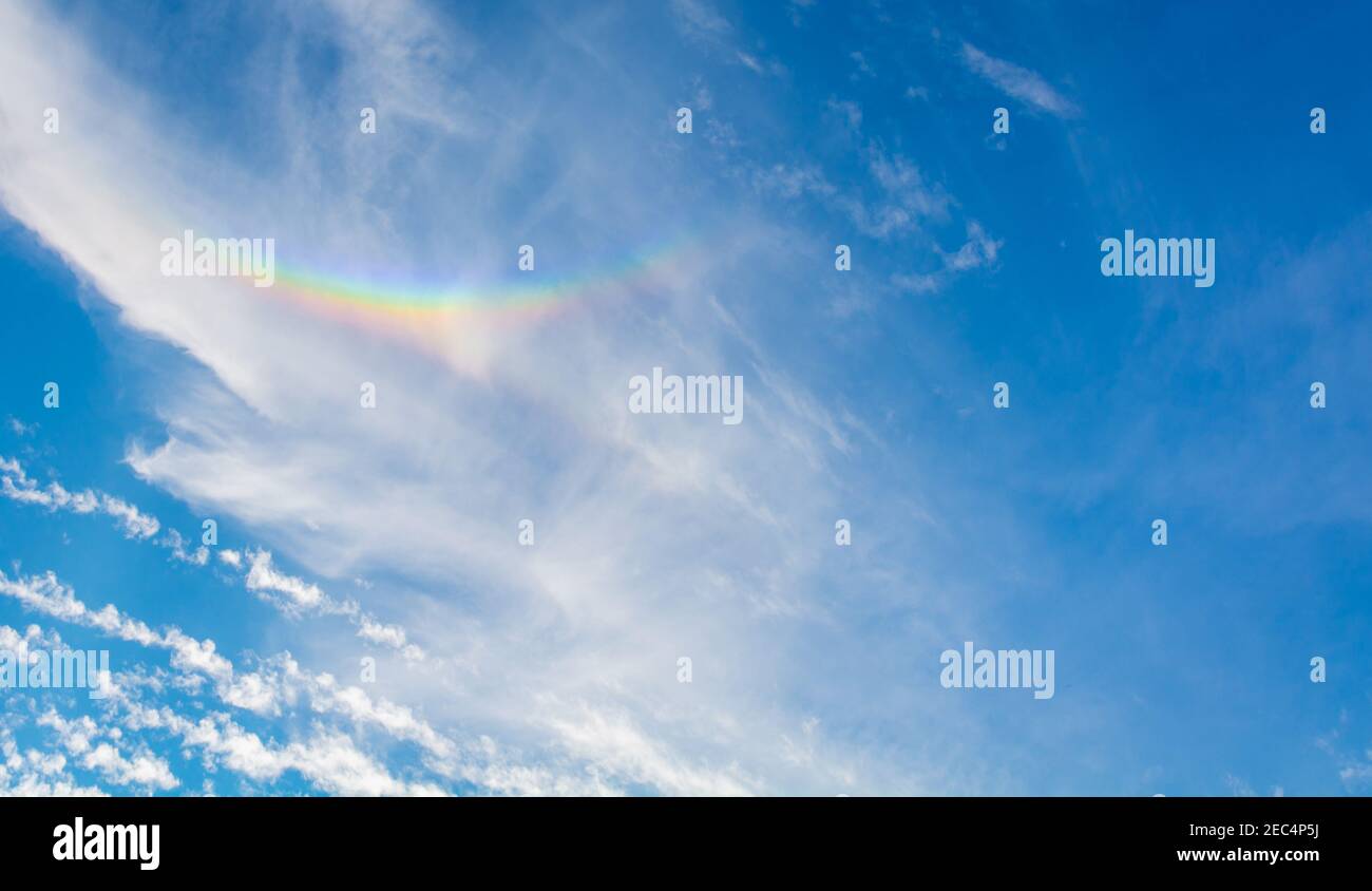 Sun dog (Parhelion)  the sky above the walls of Monteriggioni village in the Siena province, Tuscany - Italy Stock Photo