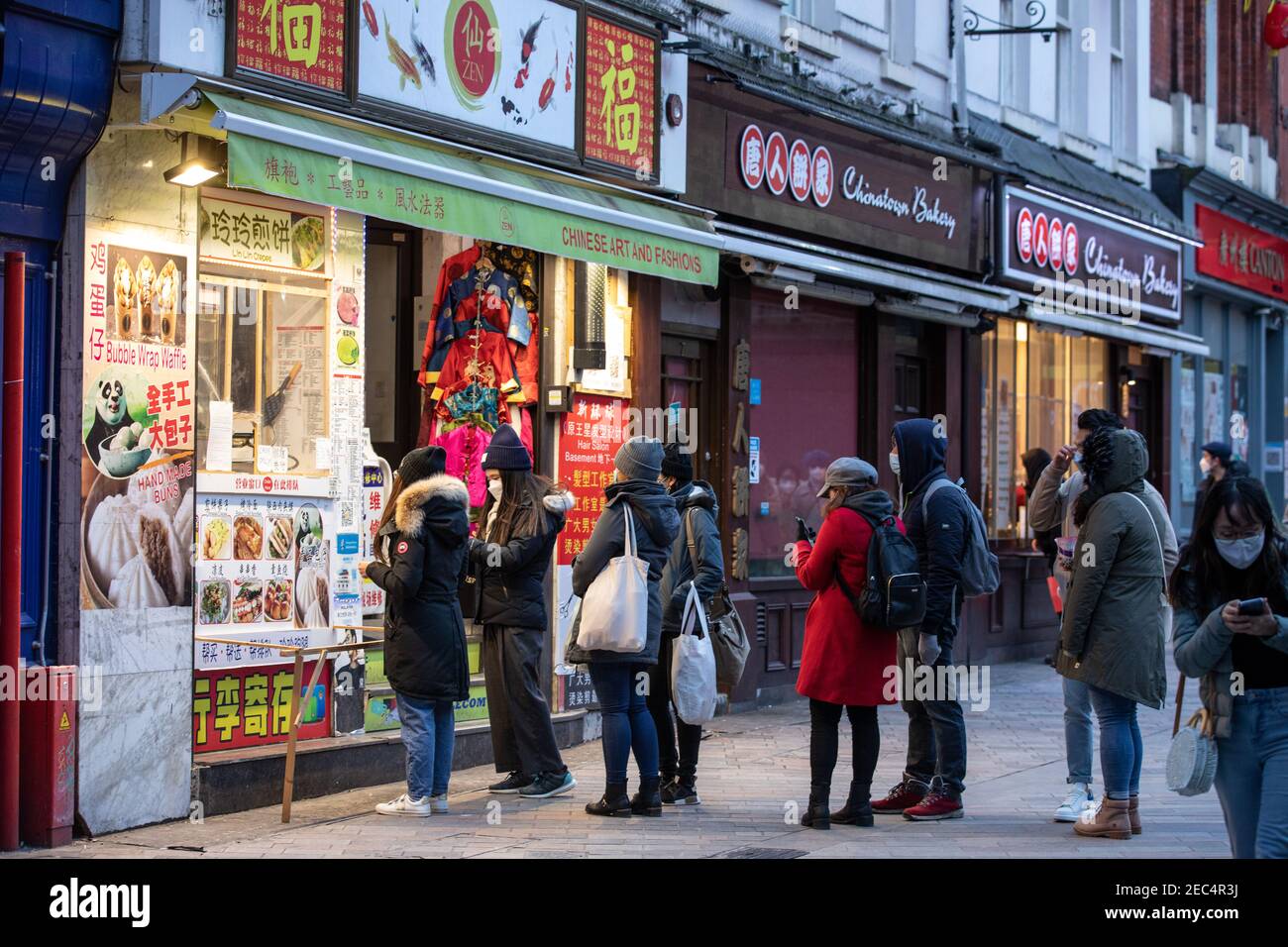 London's China Town on the first evening of the New Lunar Year, The Year of the Ox, during the Coronavirus Lockdown prohibiting the annual celebration Stock Photo