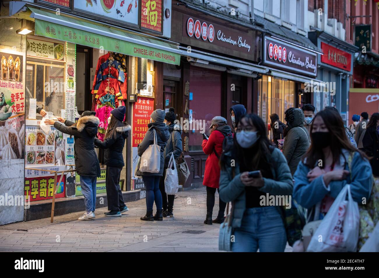 London's China Town on the first evening of the New Lunar Year, The Year of the Ox, during the Coronavirus Lockdown prohibiting the annual celebration Stock Photo