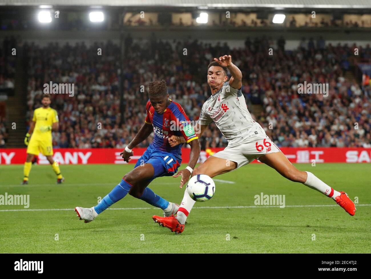 Soccer Football - Premier League - Crystal Palace v Liverpool - Selhurst Park, London, Britain - August 20, 2018  Crystal Palace's Wilfried Zaha in action with Liverpool's Trent Alexander-Arnold                          Action Images via Reuters/John Sibley  EDITORIAL USE ONLY. No use with unauthorized audio, video, data, fixture lists, club/league logos or 'live' services. Online in-match use limited to 75 images, no video emulation. No use in betting, games or single club/league/player publications.  Please contact your account representative for further details. Stock Photo