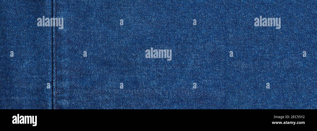 Dark blue jeans denim texture fabric background Stock Photo - Alamy