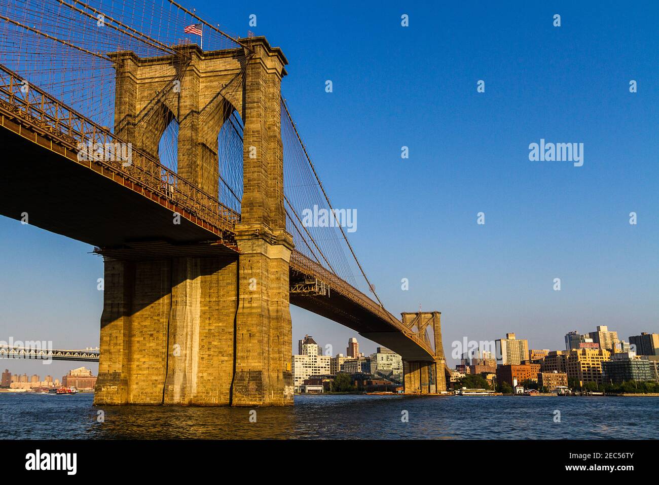 Brooklyn Bridge seen from Manhattan side with Brooklyn cityscape in the background Stock Photo