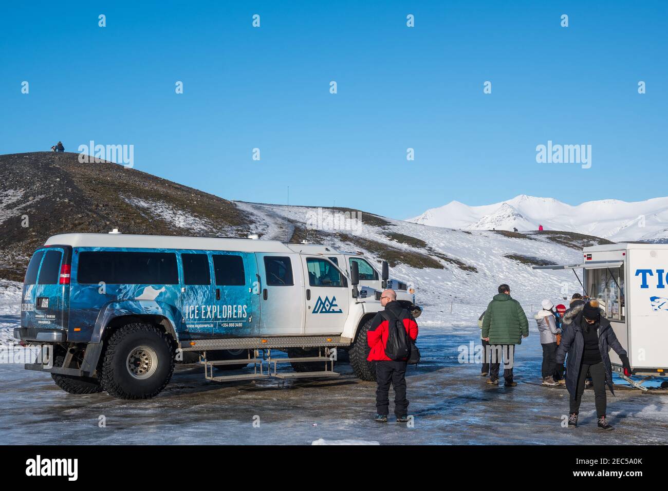 Jokulsarlon Iceland - February 17. 2019: people in front of glacier truck from Ice Explorers Stock Photo