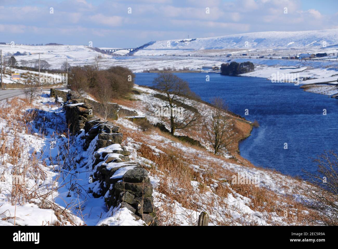Looking across Booth Wood Reservoir towards Scammonden Bridge  the spans the M62. Stock Photo