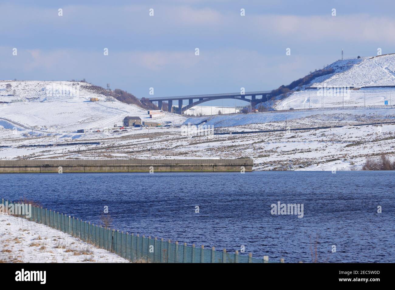 Looking across Booth Wood Reservoir towards Scammonden Bridge  the spans the M62. Stock Photo