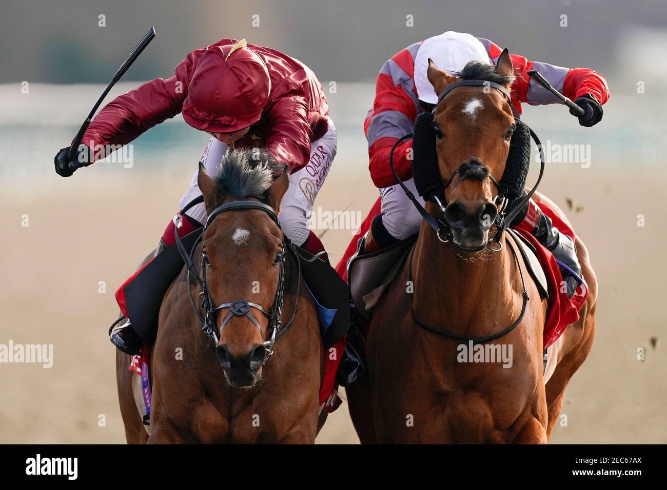 Twilight Heir ridden by Cieren Fallon (left) battle it out to win The Get Your Ladbrokes Daily Odds Boost Handicap from Ben Curtis riding Charlie Fellowes (right) at Lingfield Park Racecourse. Picture date: Saturday February 13, 2021. Stock Photo