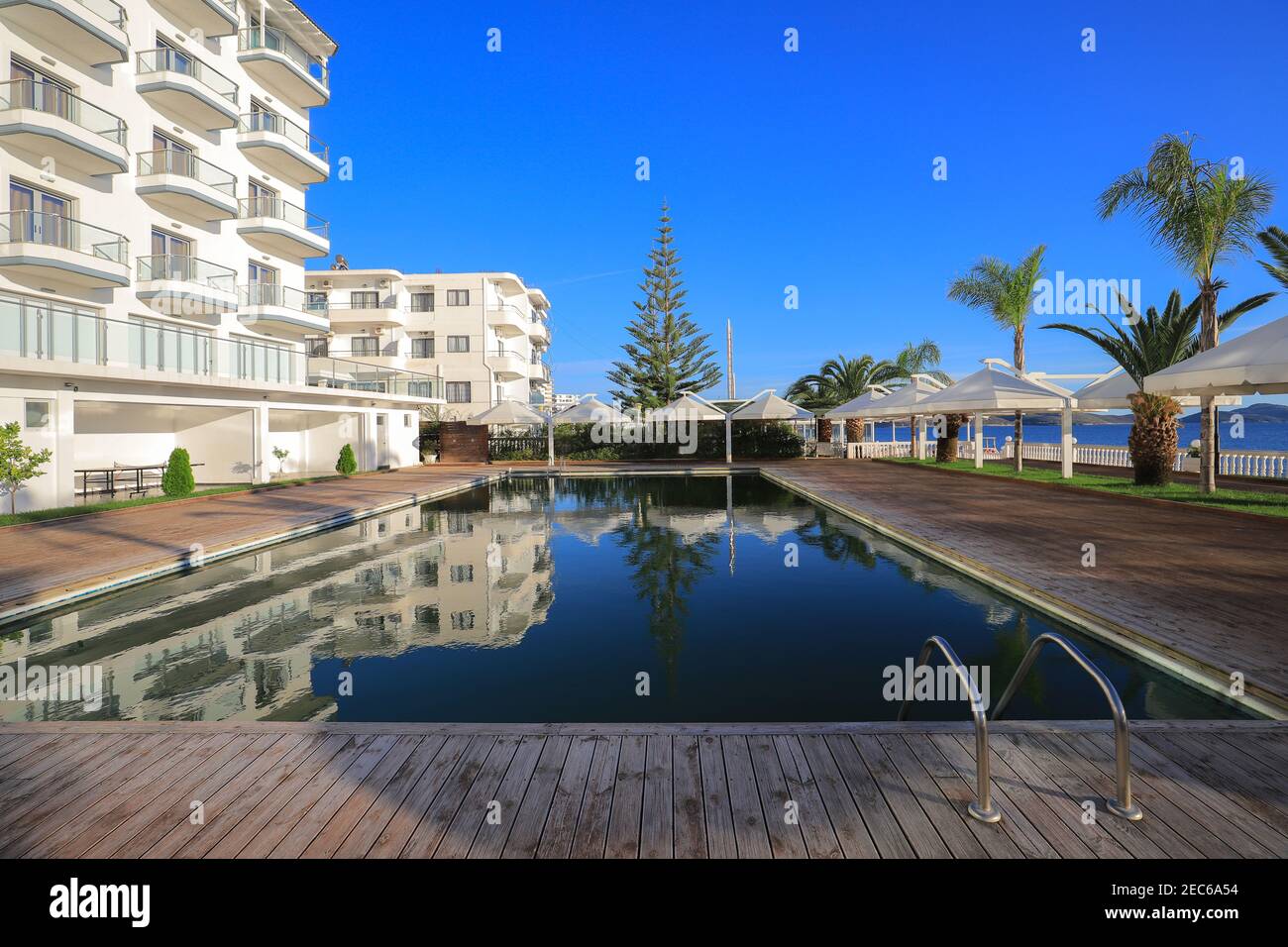Outdoor swimming pool in resort hotel in Saranda, Albania Stock Photo