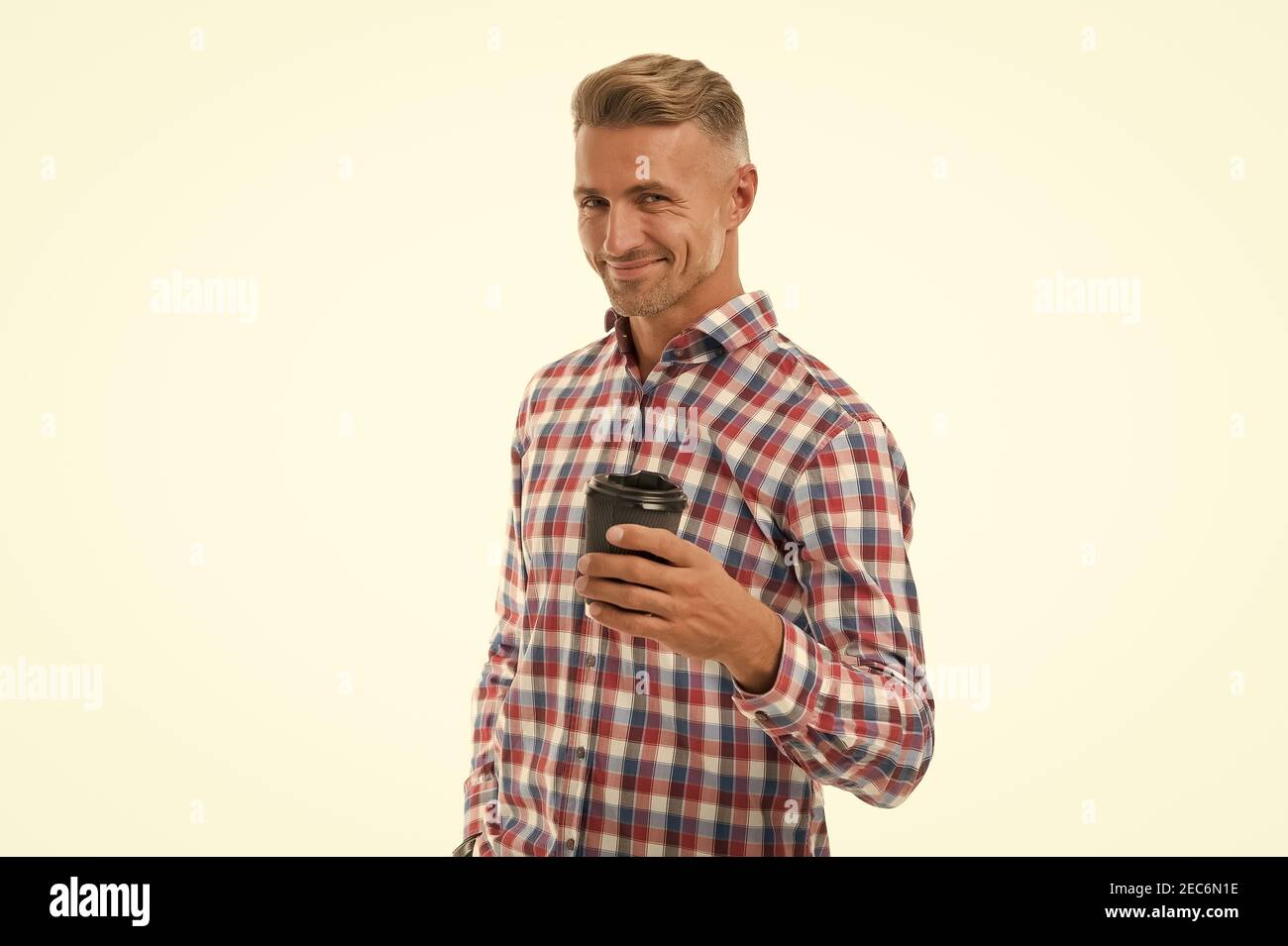 Morning begins after coffee. Happy guy drink coffee in morning