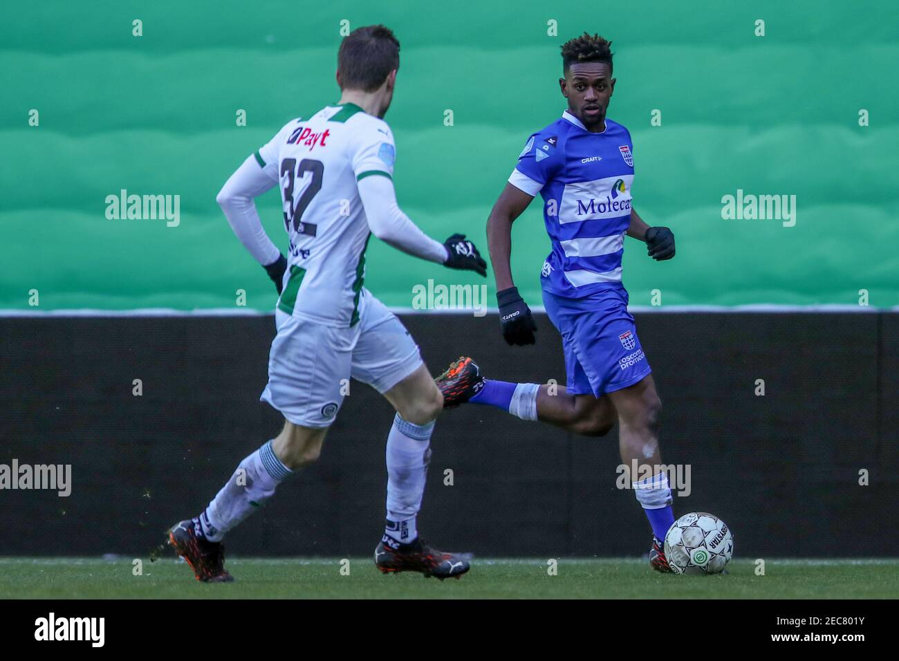 Groningen Netherlands February 13 Mike Te Wierik Of Fc Groningen Virgil Misidjan Of Pec Zwolle During The Dutch Eredivisie Match Between Fc Groningen And Pec Zwolle At Hitachi Capital Mobility Stadion