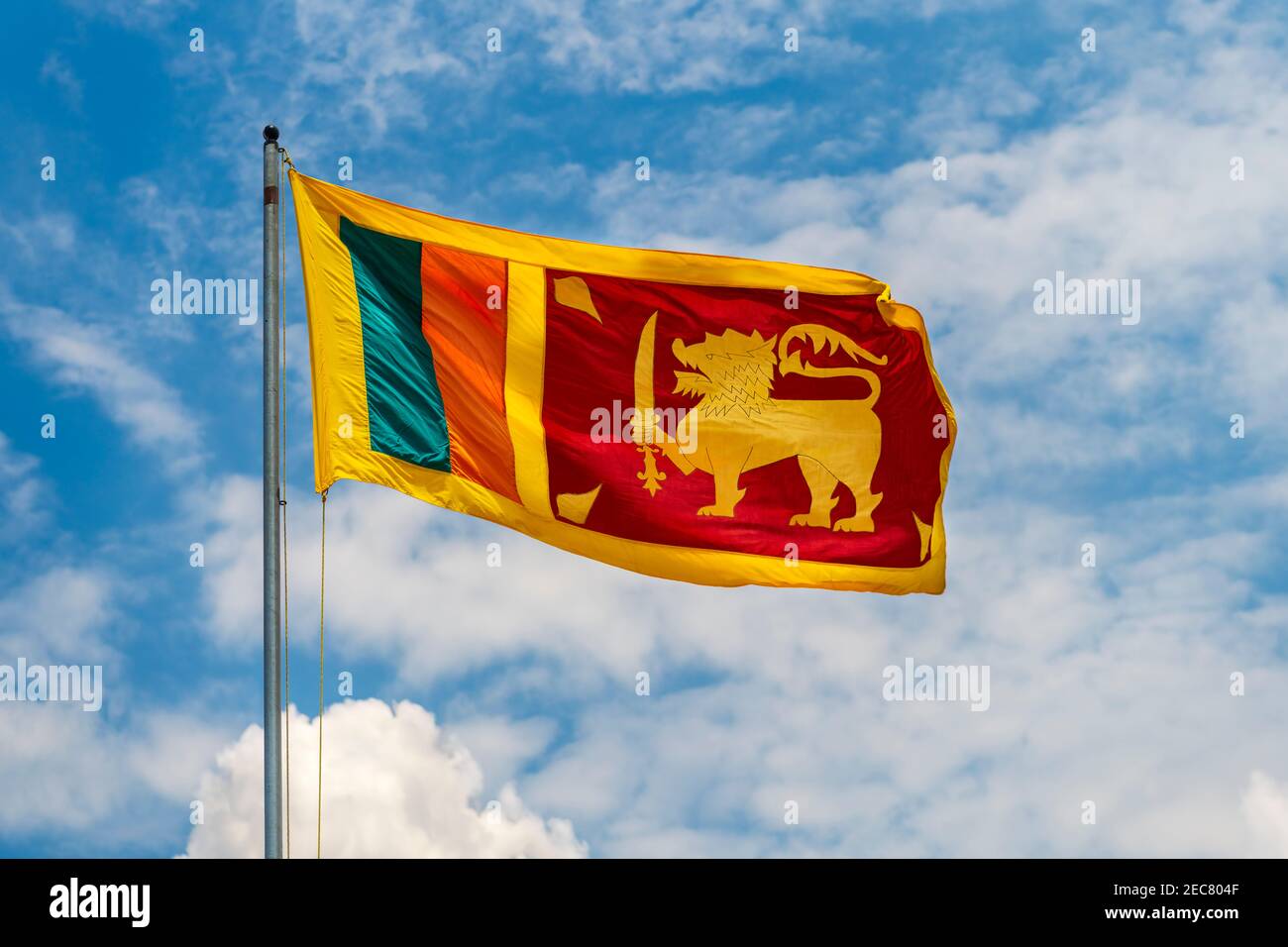 The Sri Lankan National flag against a summer sky. Stock Photo