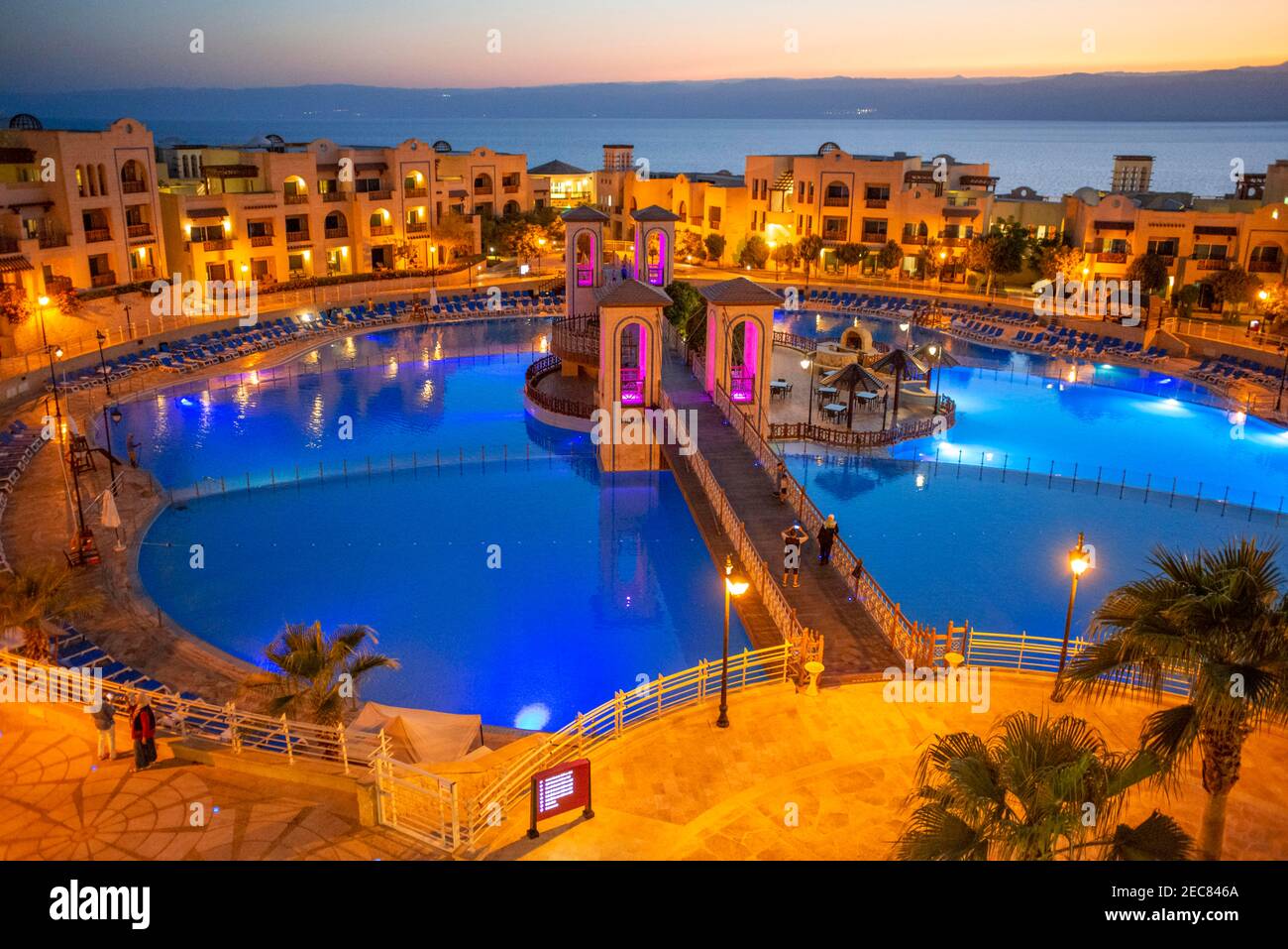 View over the luxurious Crowne Plaza Dead sea hotel in the dead sea, Jordan.  Pools and Dead Sea at sunset Stock Photo - Alamy