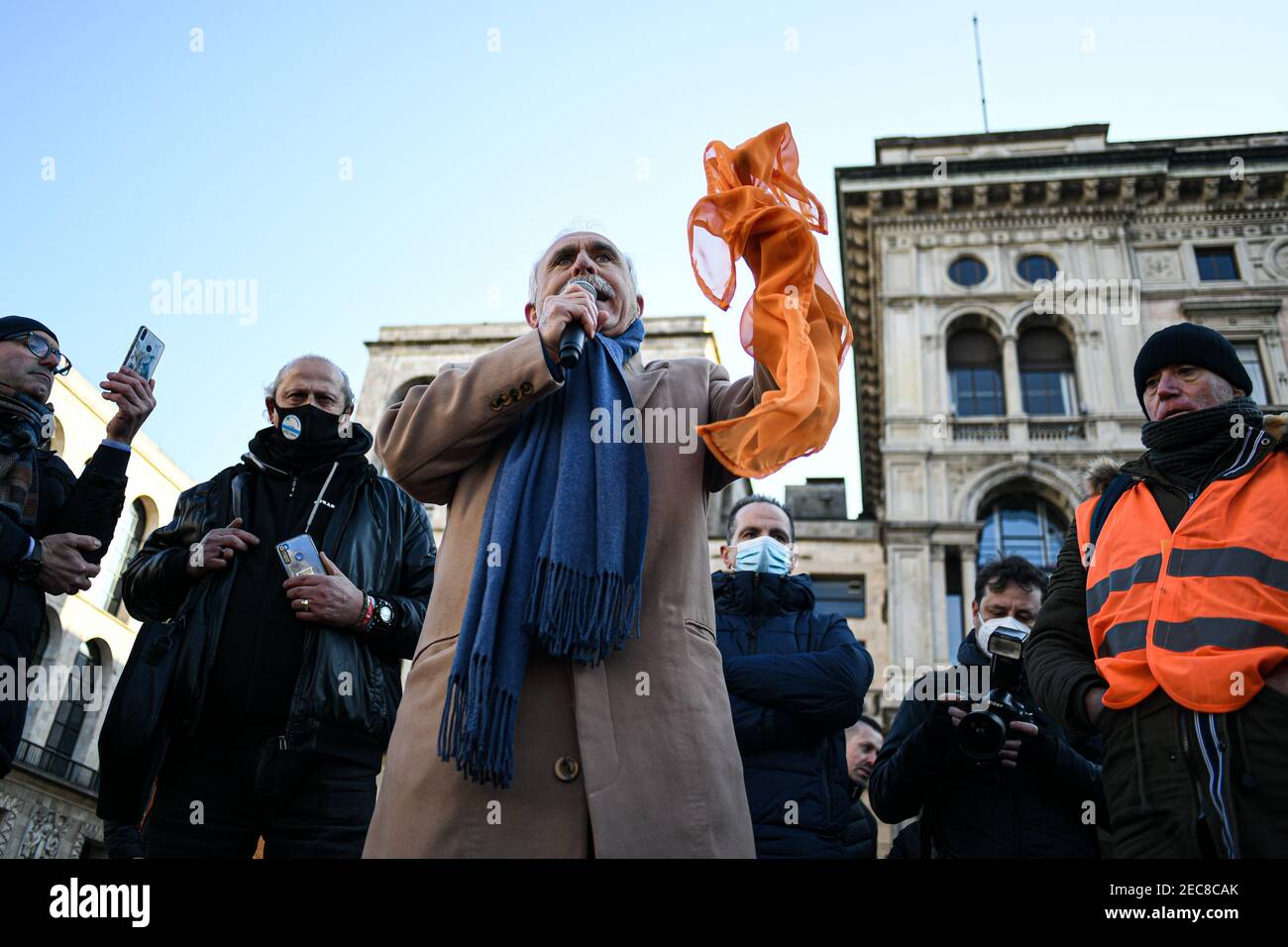 Milan, Italy. 13th Feb, 2021. Retired general Antonio Pappalardo, speaks during an Orange Vests (Gilet Arancio) rally in Piazza Duomo in Milan, Italy on 13 February 2021 Credit: Piero Cruciatti/Alamy Live News Stock Photo
